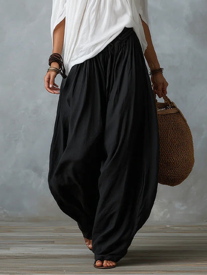 White off-shoulder top and lantern-style flared pants